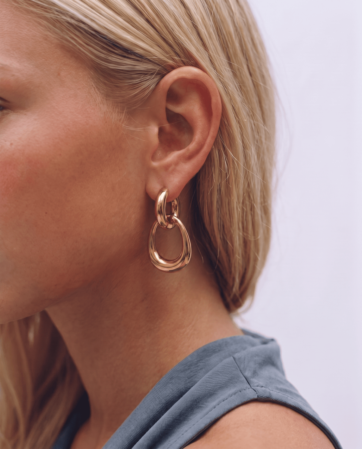 Gold-tone huggie earrings with oval link drop in Gold