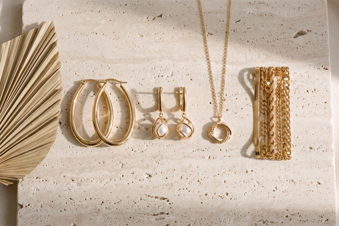 Gold-tone jewellery edit: hoops, pearl drops, pendant and bracelet set