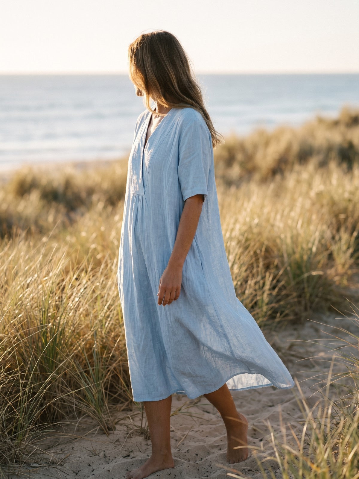 The Summer Edit – light blue linen midi dress on a coastal dune path