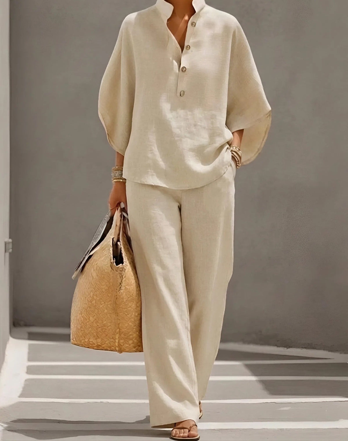 Button-up shirt and wide-leg pants set in sand – front