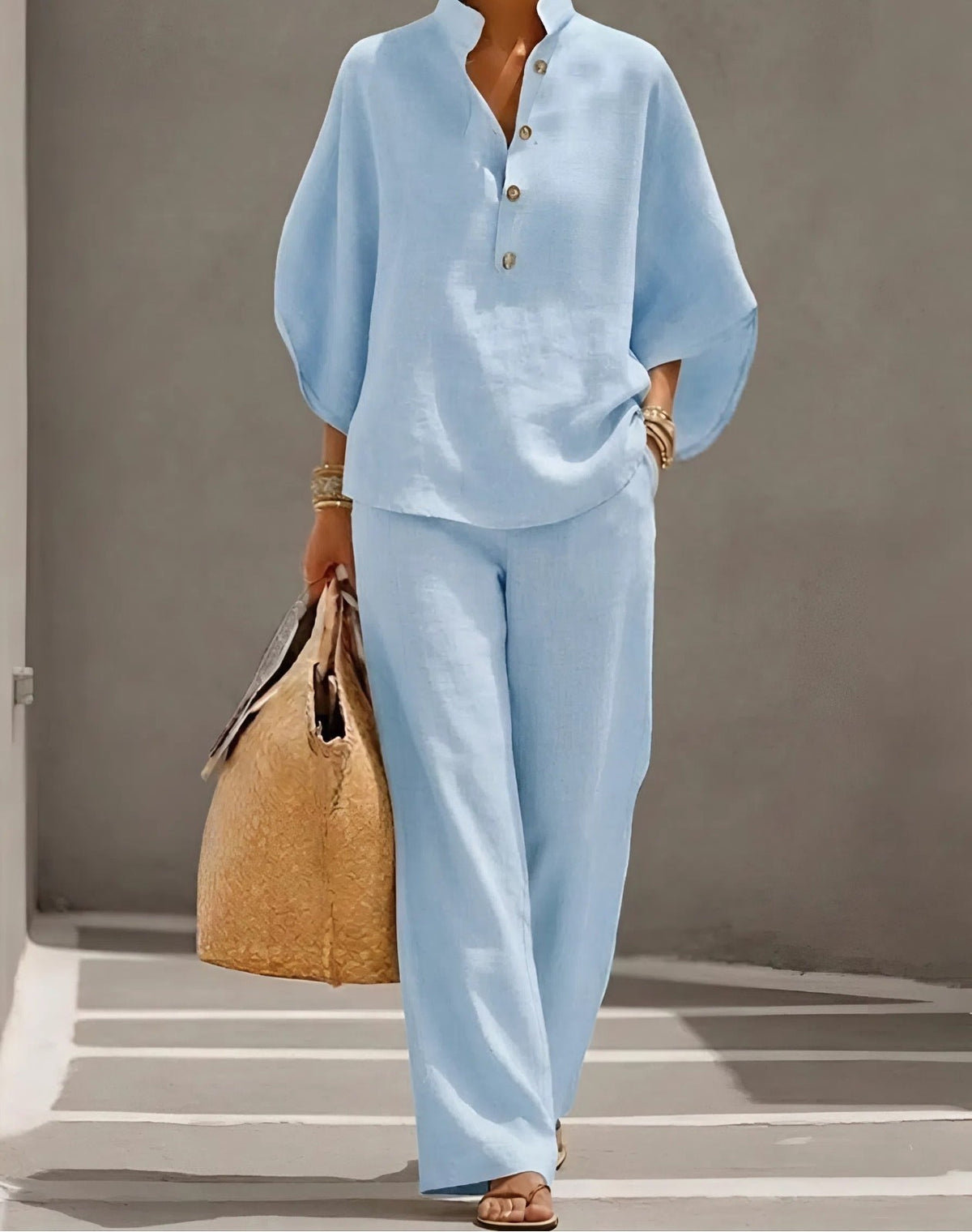 Button-up shirt and wide-leg pants set in light blue – front