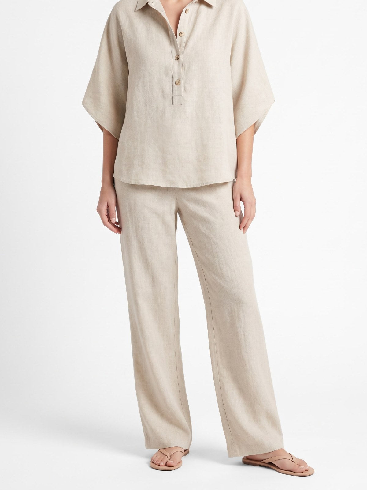 Sand button-up shirt and wide-leg pants set on a white background