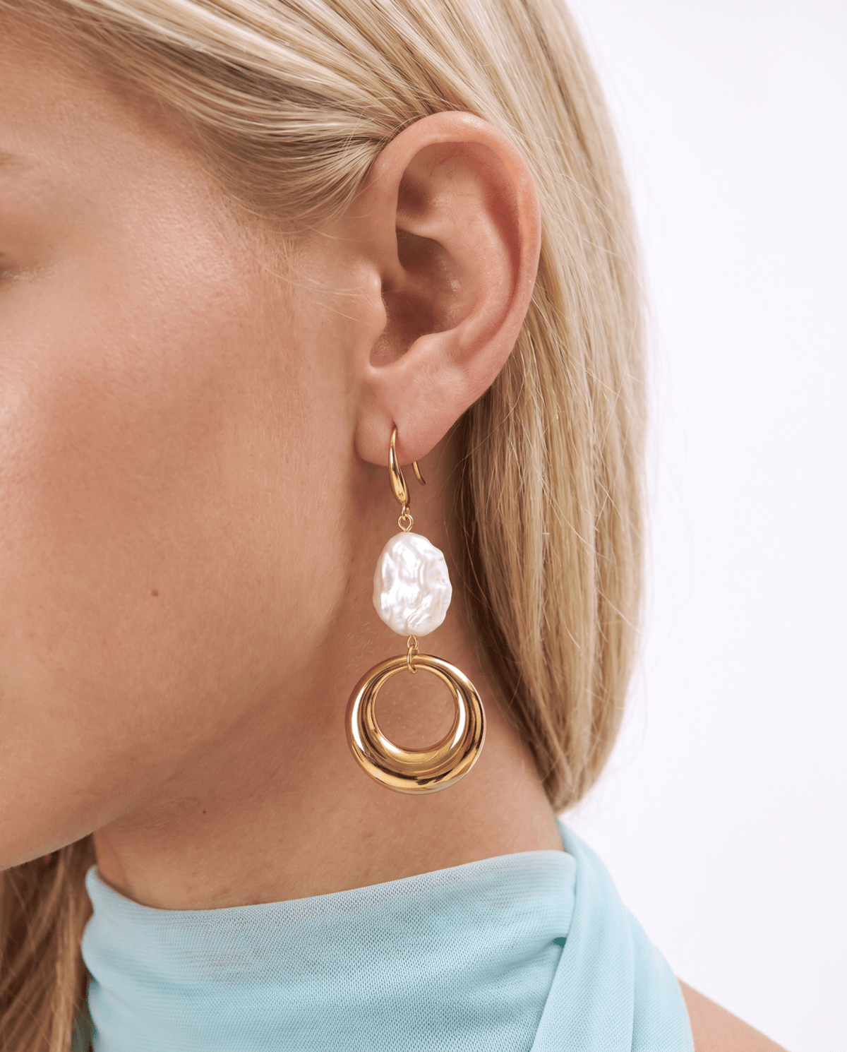 Faux pearl drop earrings with gold-tone ring in gold