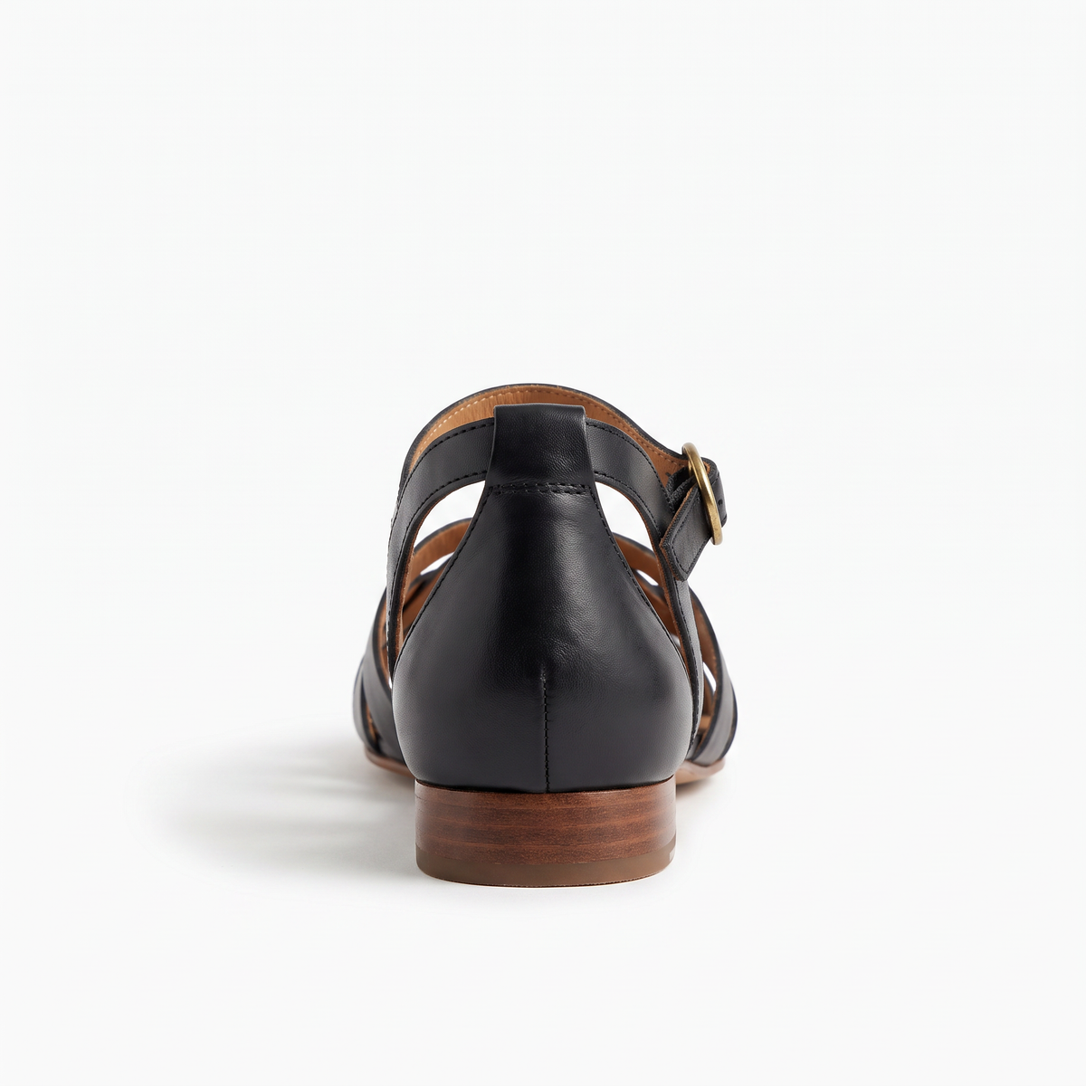 Flat sandals with crossover straps and ankle buckle in Black