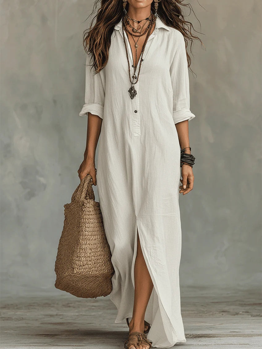 Flowing floor-length maxi dress in white - front
