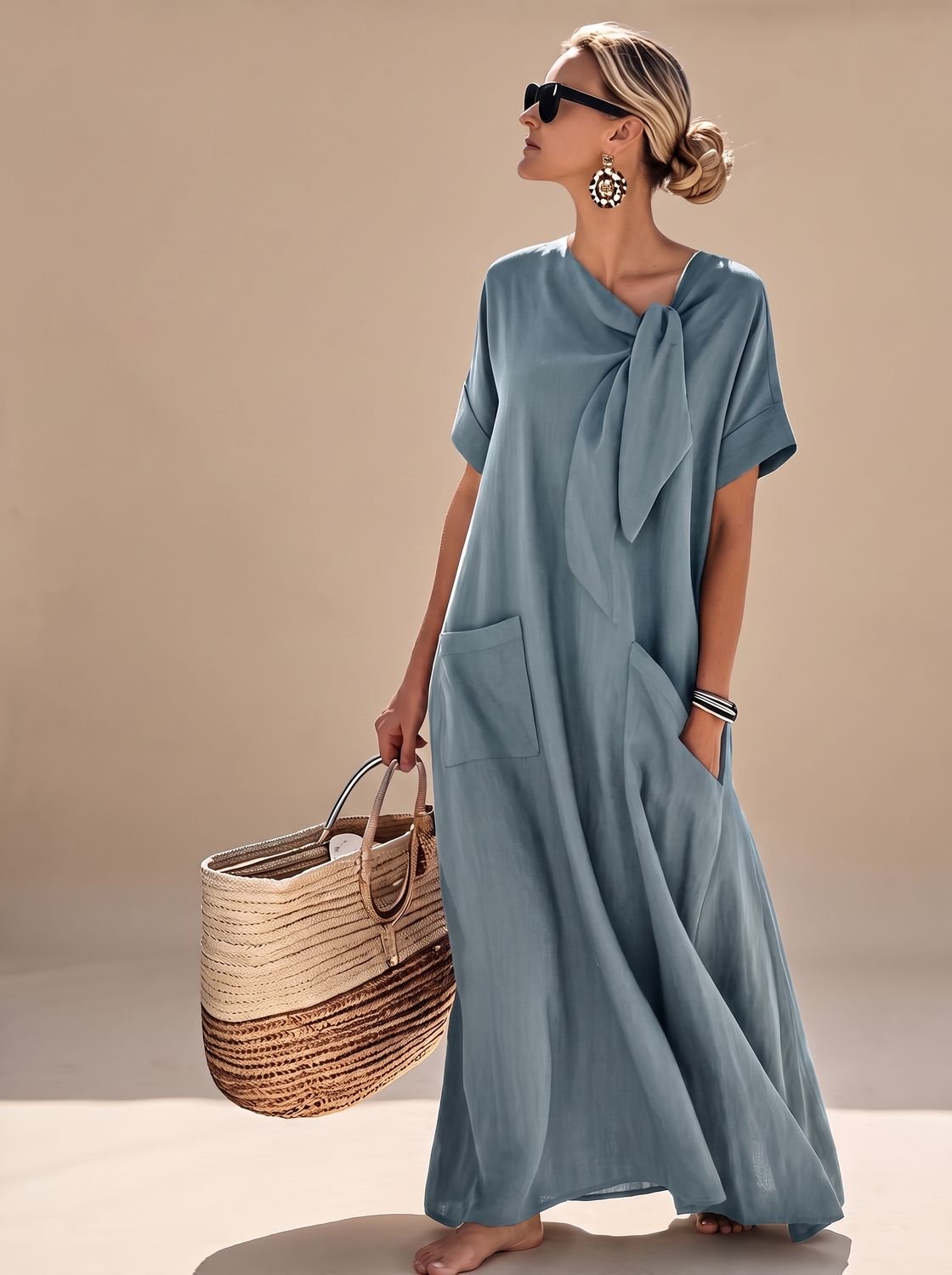 Flowy maxi dress with neck tie and pockets in Blue
