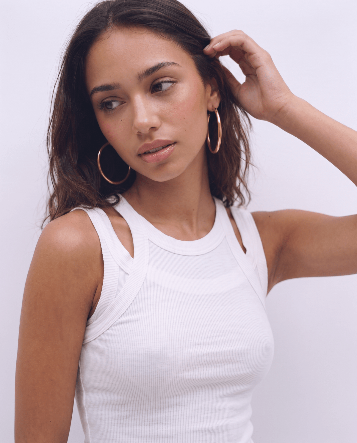Gold-tone hoop earrings with classic round shape in Gold