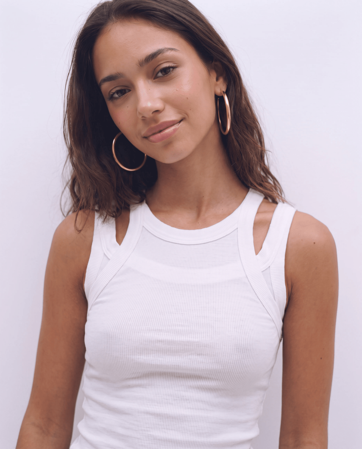 Gold-tone hoop earrings with classic round shape in Gold