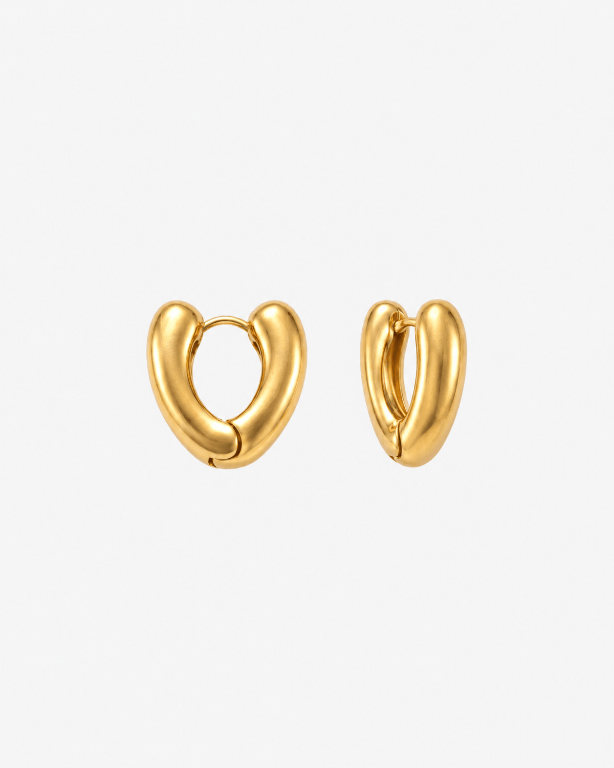 Gold-tone huggie earrings with chunky heart shape