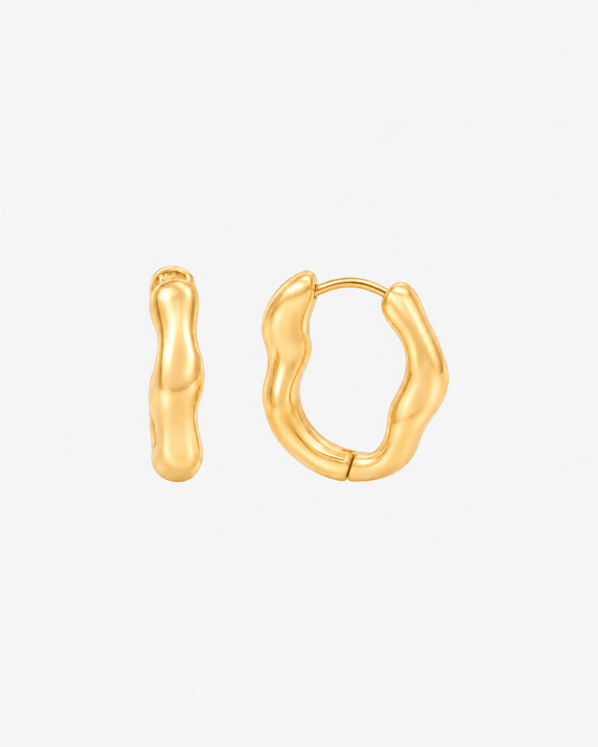 Gold huggie earrings with chunky wavy design in gold tone