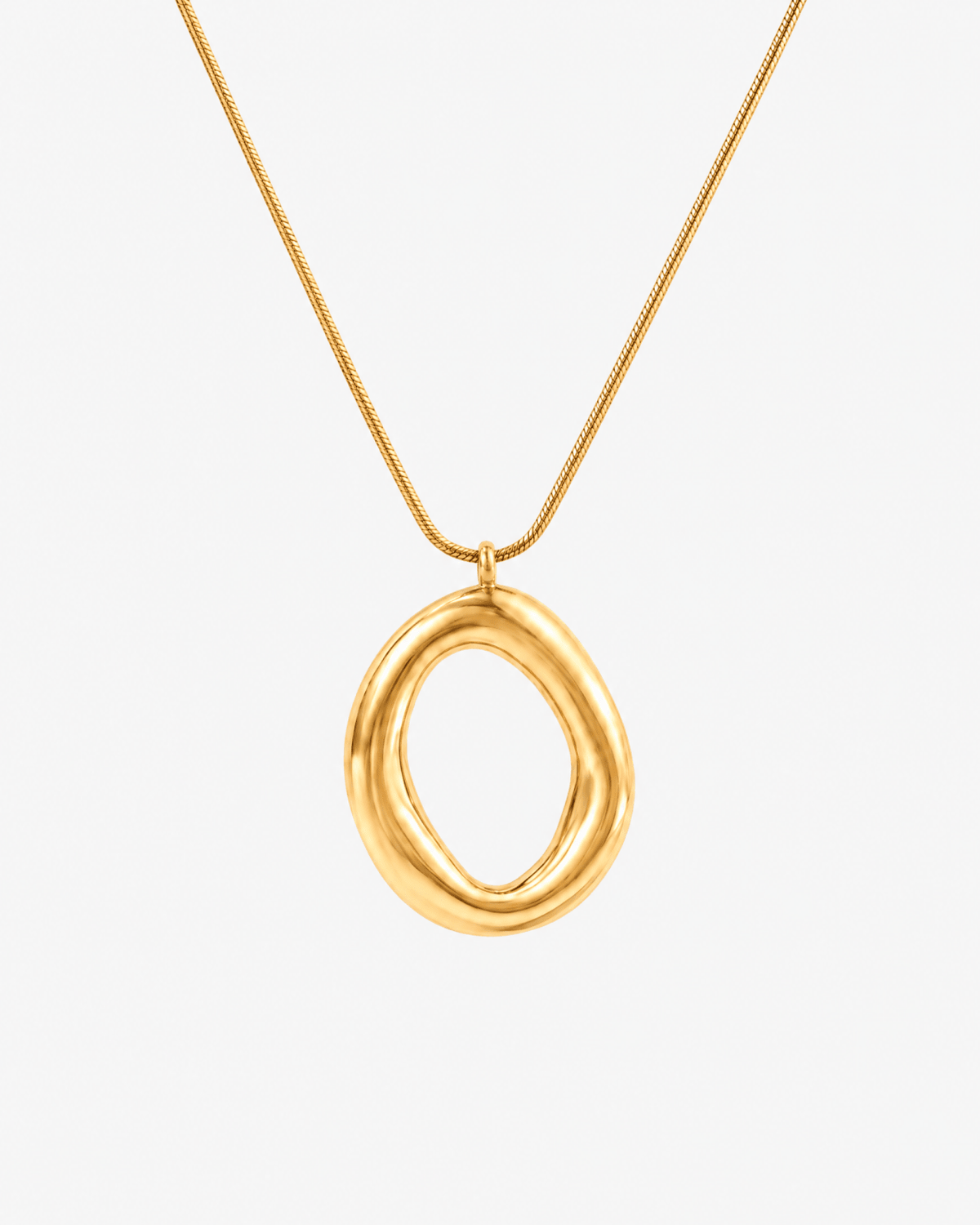 Gold-tone pendant necklace with open circle on snake chain