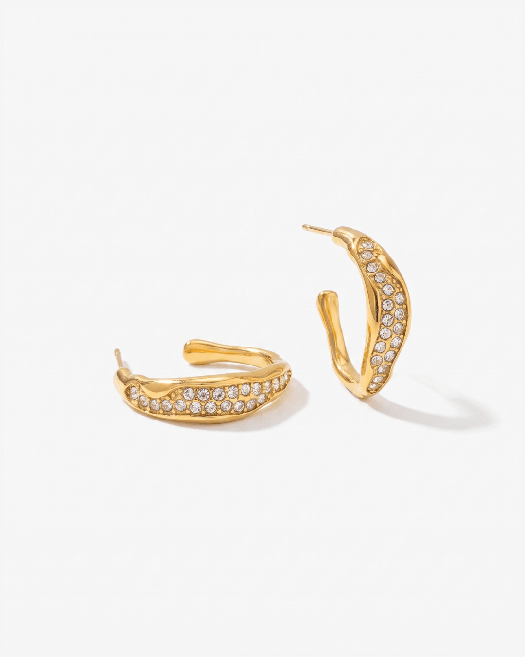 Gold-tone wavy hoop earrings with pave stones in Gold
