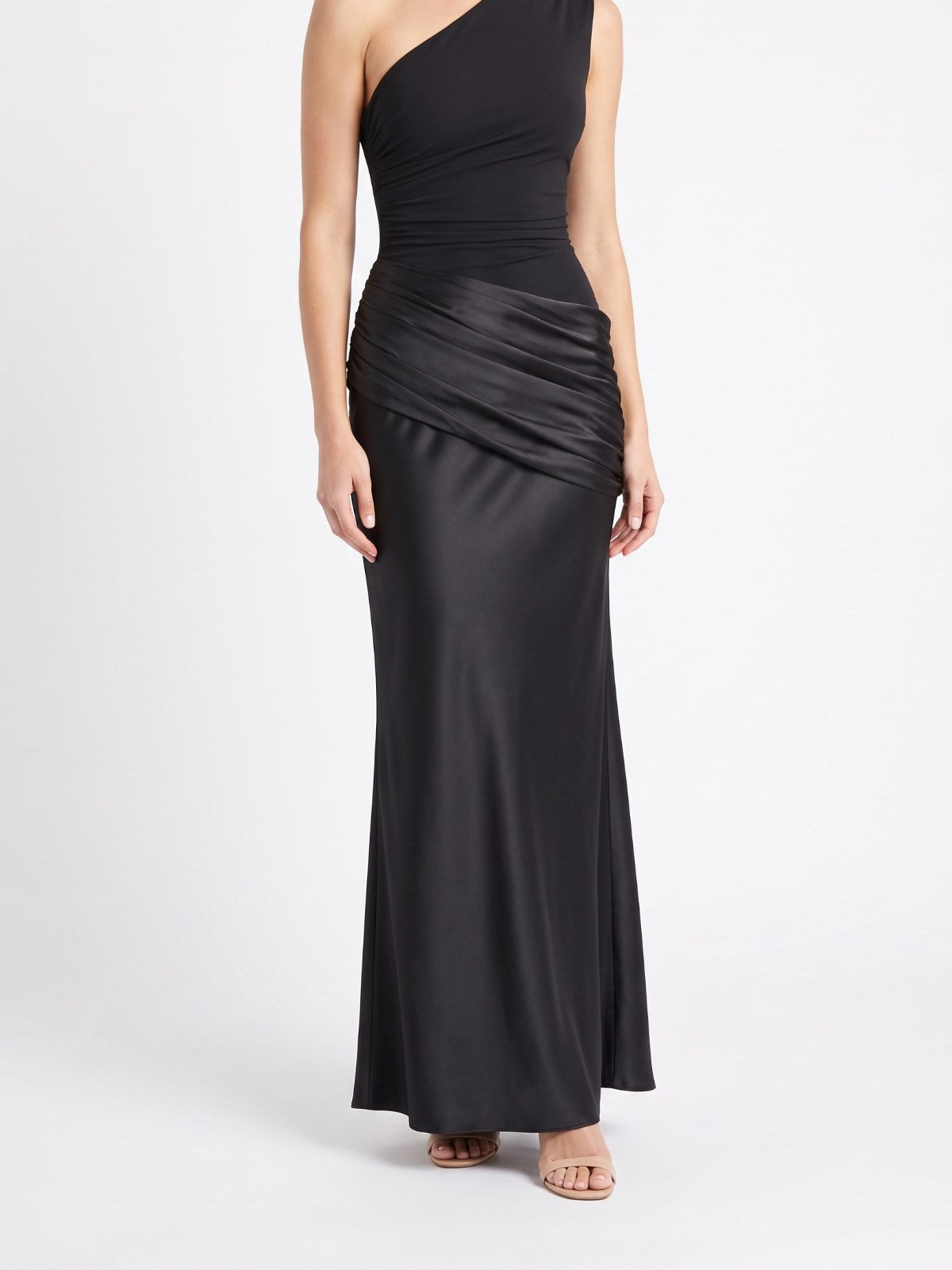 Black one-shoulder satin maxi dress on a white background