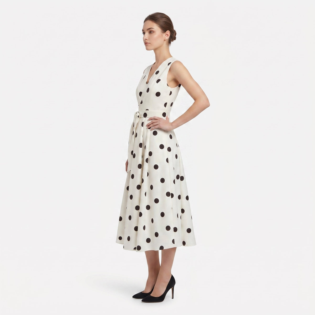 Polka dot midi dress in white - side