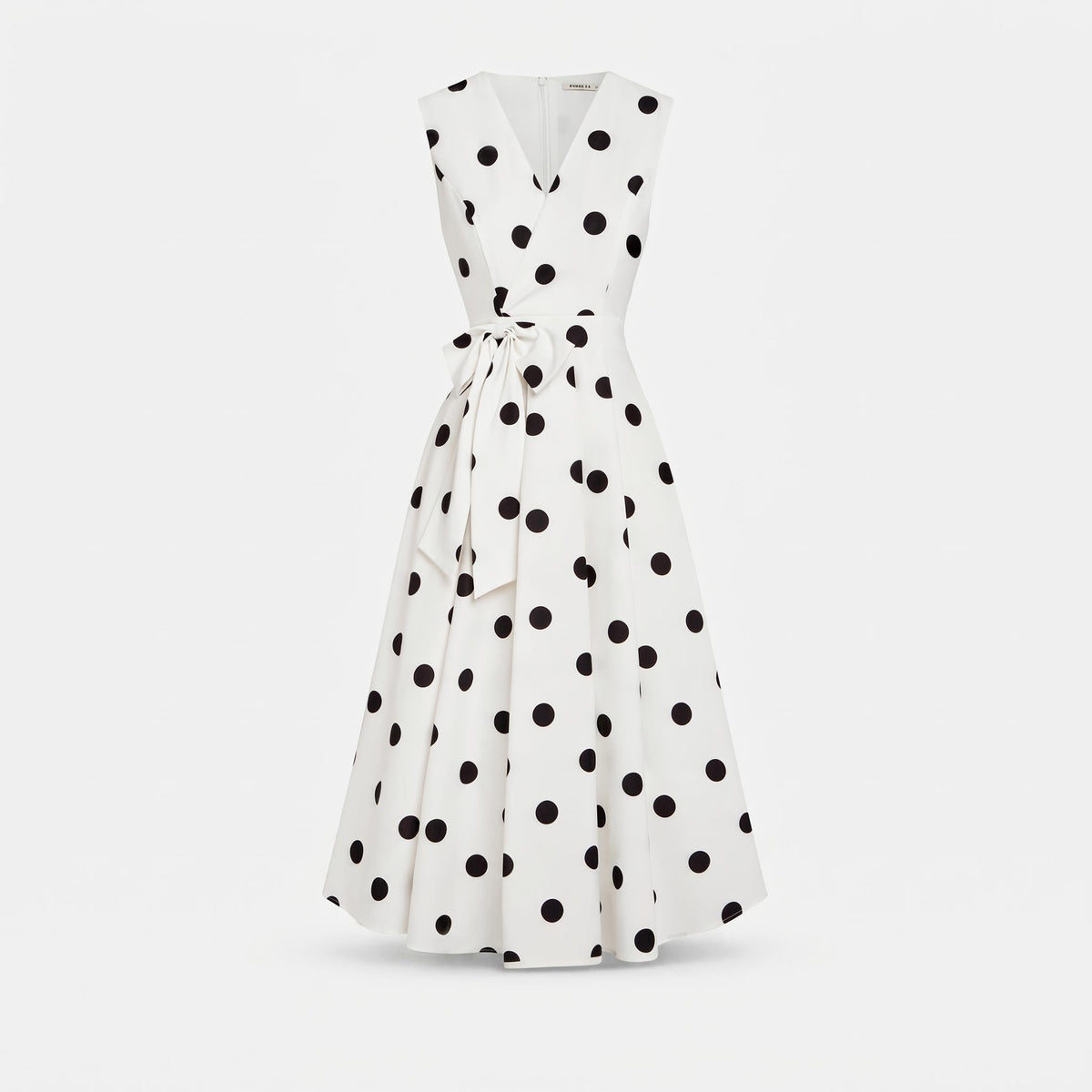 Polka dot midi dress in white - flat lay