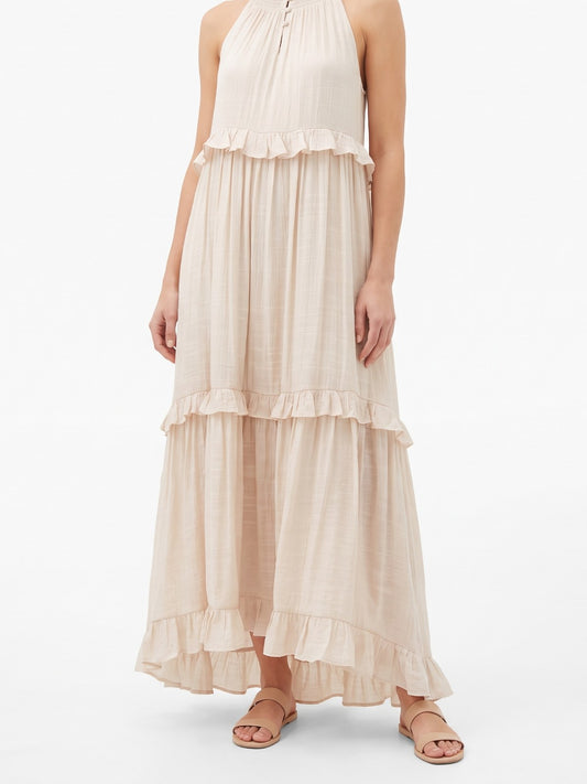 Cream tiered ruffle halter maxi dress on a white background