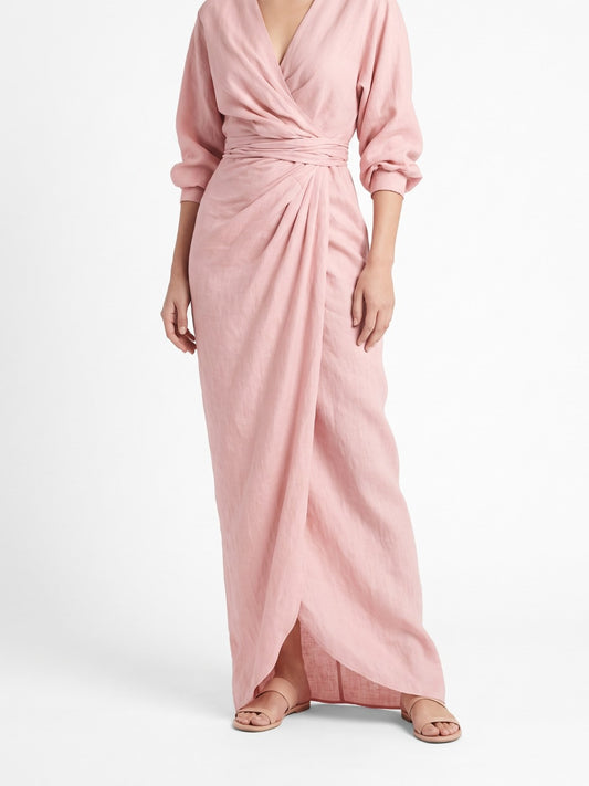 Pink V-neck ruched wrap maxi dress with 3/4 sleeves on a white background