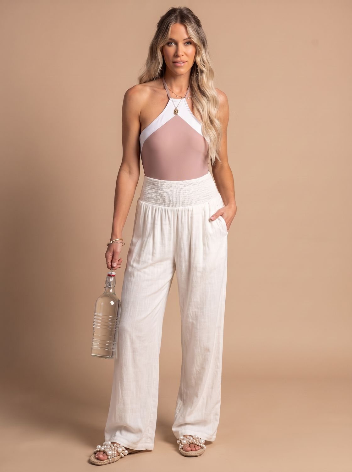 Wide leg linen-look pants with smocked high waist in white