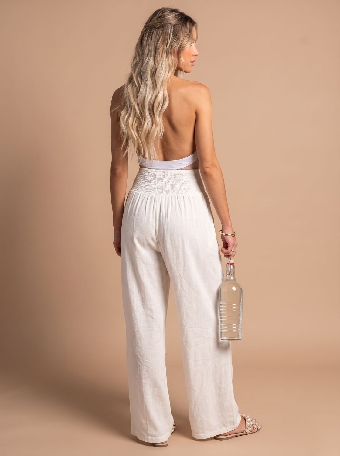 Wide leg linen-look pants with smocked high waist in white