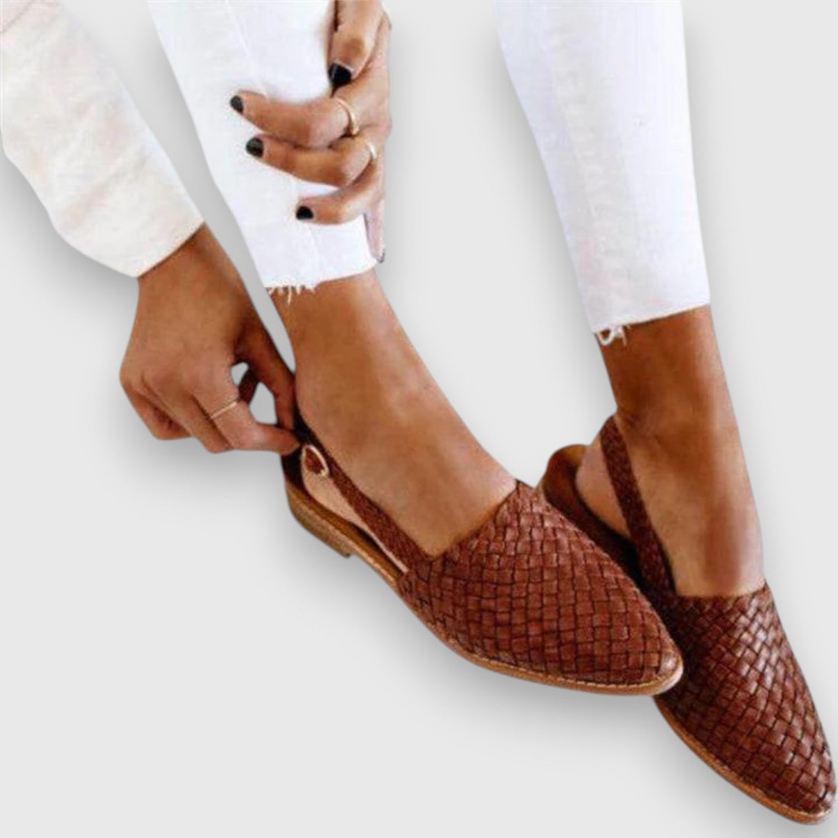Woven flat sandals with closed toe in brown