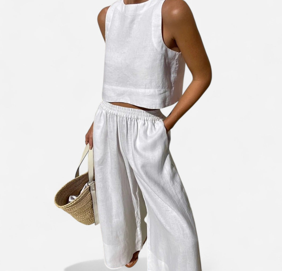 Linen sleeveless crop top and wide-leg pants set in white – front
