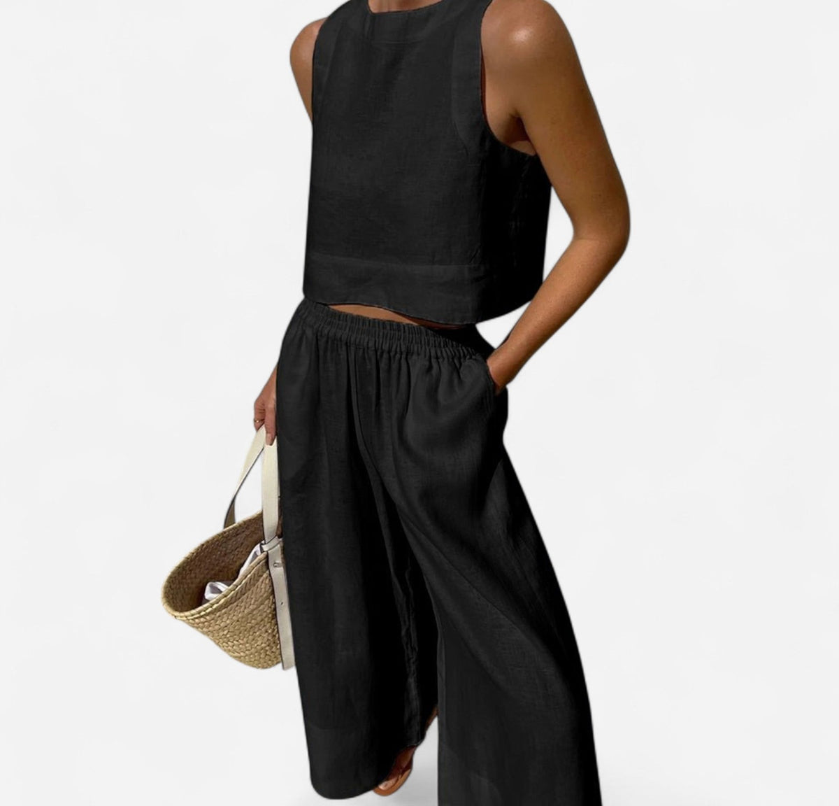 Linen sleeveless crop top and wide-leg pants set in black – front