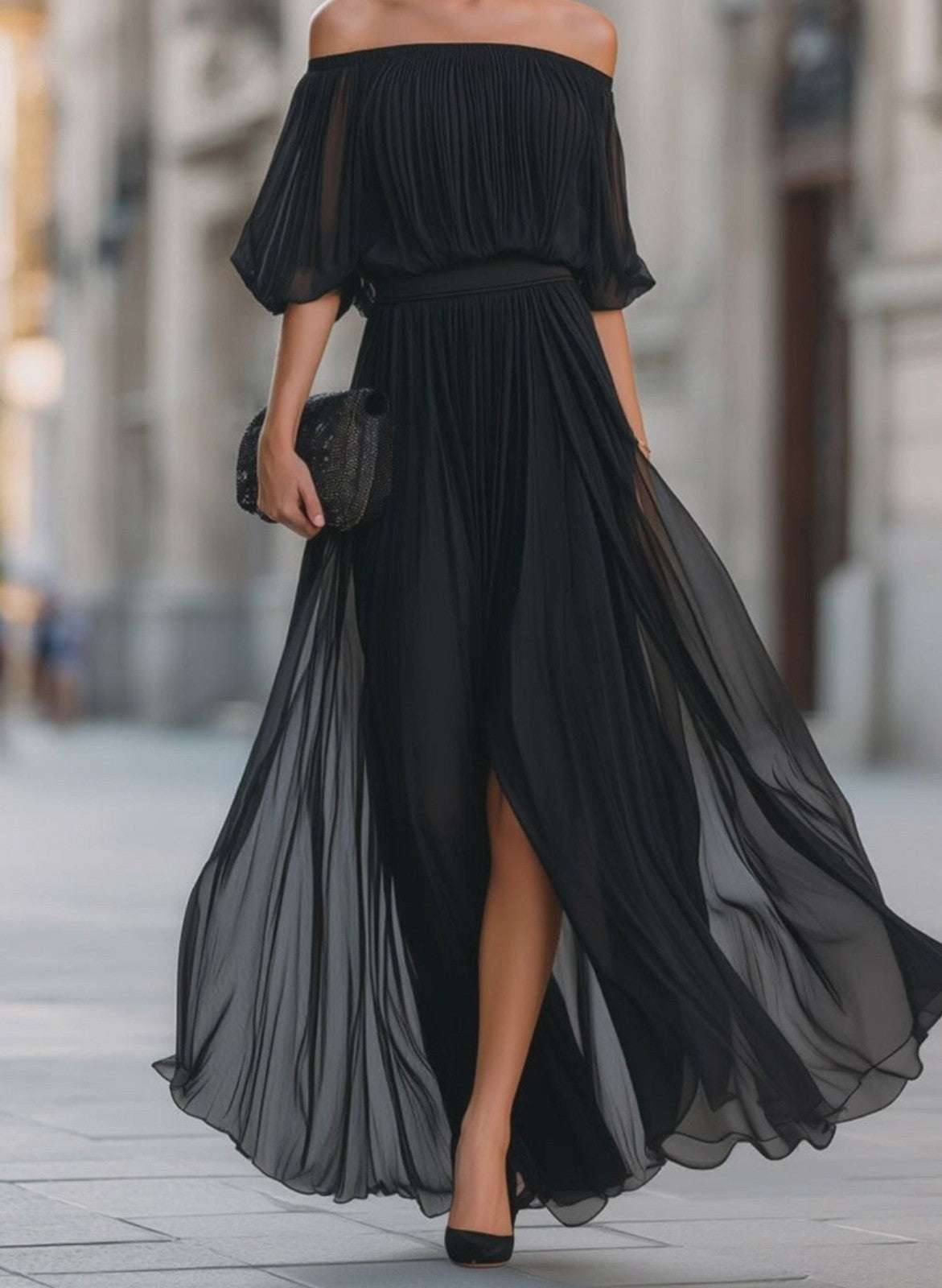 Off-shoulder pleated chiffon maxi dress in black – front