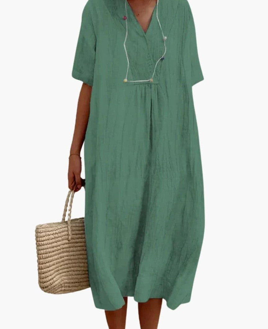 Relaxed linen V-neck midi dress in sage green – front