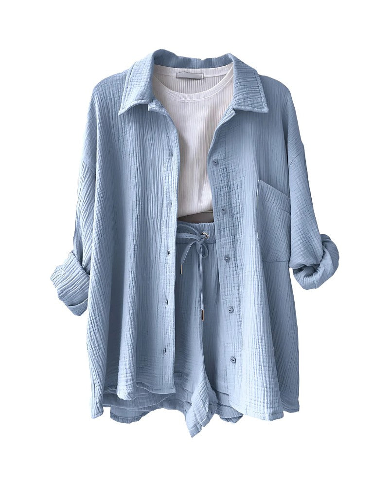 Textured button-up shirt and shorts set in light blue – flat lay