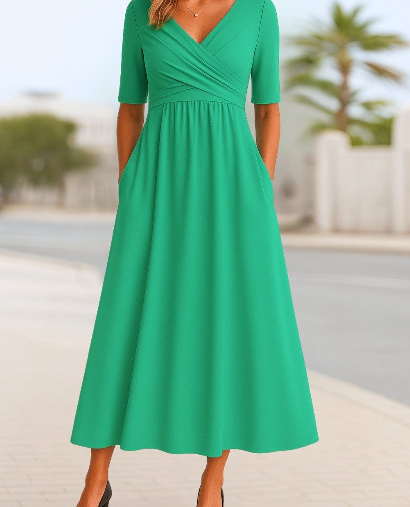 V-neck cross-over A-line midi dress in green – front