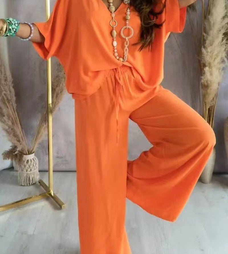 V-neck top and wide-leg pants set in orange – front